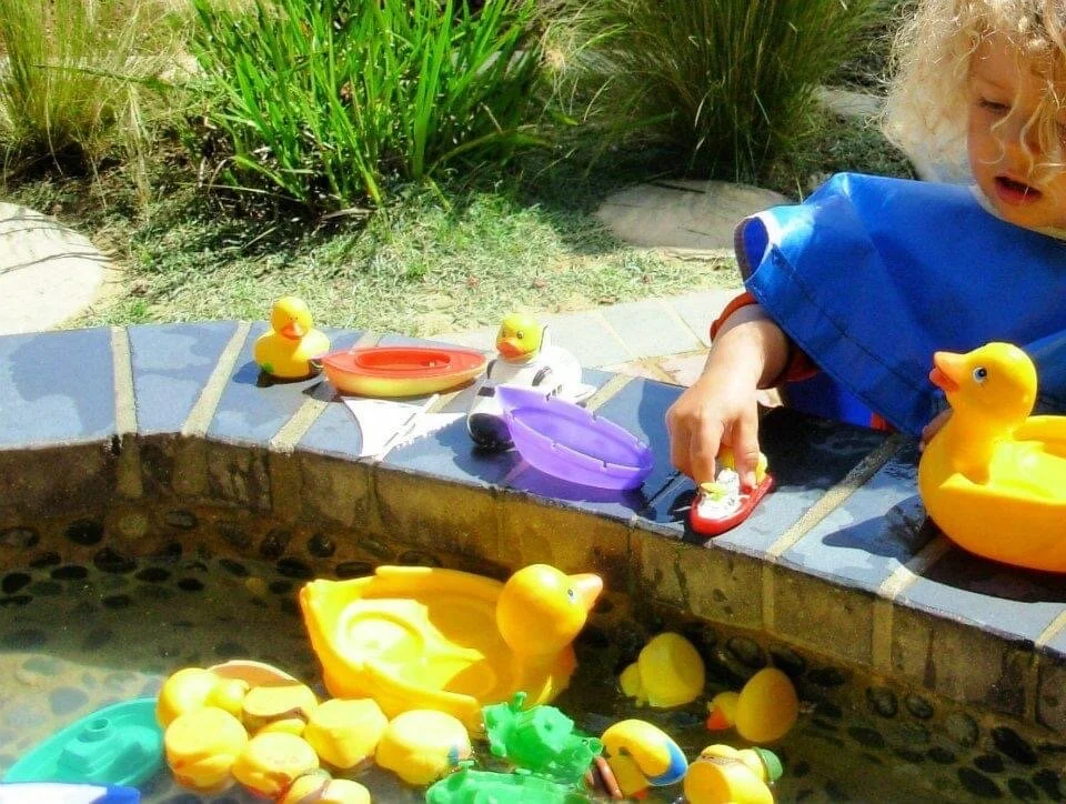 Children engaging in play as part of the comprehensive educational programs.