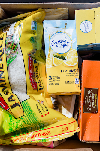Volunteers dropping off donations at the San Diego Food Bank — a central hub for hunger relief in Del Mar and the wider San Diego area.